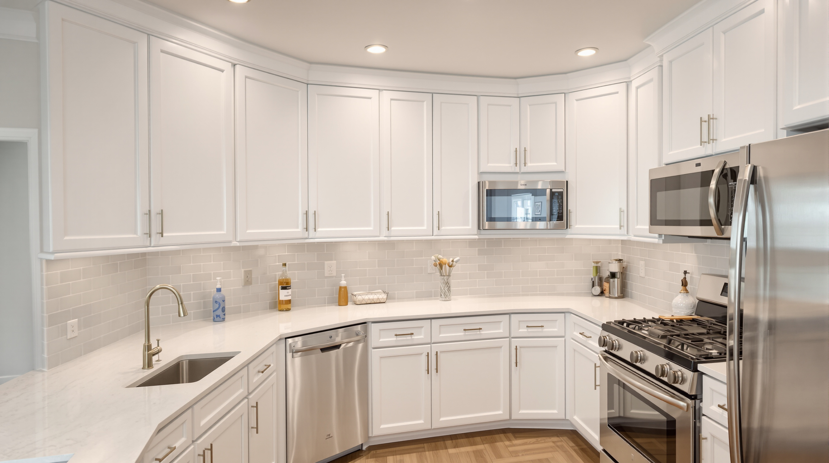Sleek white and walnut kitchen after remodel